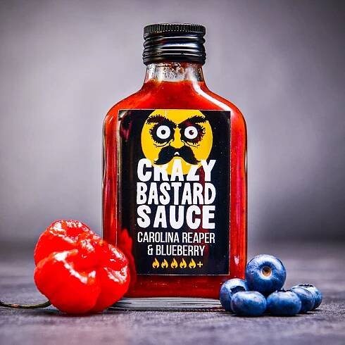 Šíleně pálivá omáčka Crazy Bastard Carolina Reaper & Blueberry 100 ml