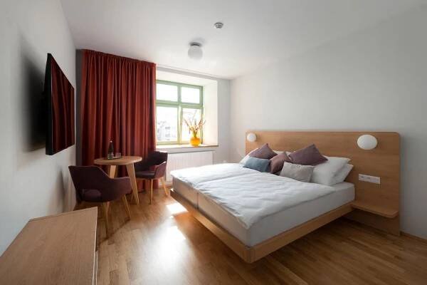Postel nebo postele na pokoji v ubytování Hotel Tři knížata