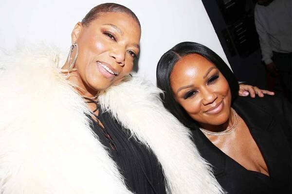 Queen Latifah and Eboni Nichols pose at the opening night after party for the new play "Purpose" on Broadway at The Edison Rooftop on March 17, 2025 in New York City. 