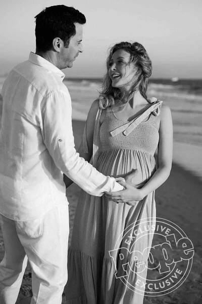 Jennifer Finnigan and Jonathan Silverman