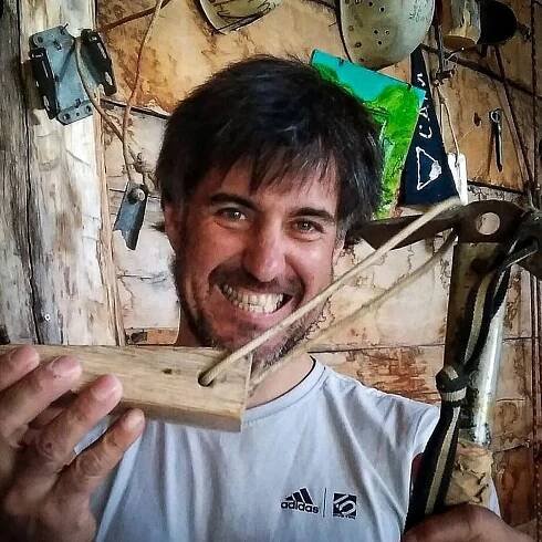 Close shot of Carlos Suarez with an ice-axe
