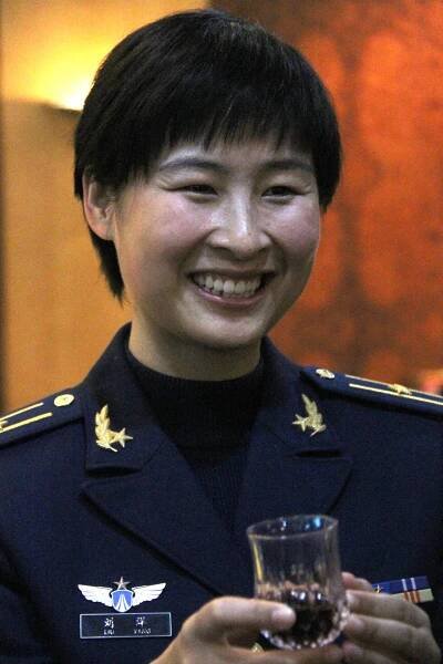 China prepares for launch, names female astronaut