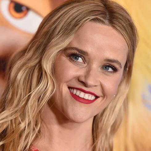 Reese Witherspoon Just Convinced Me to Wear Hot Pink Lipstick for the Holidays – See Photo
