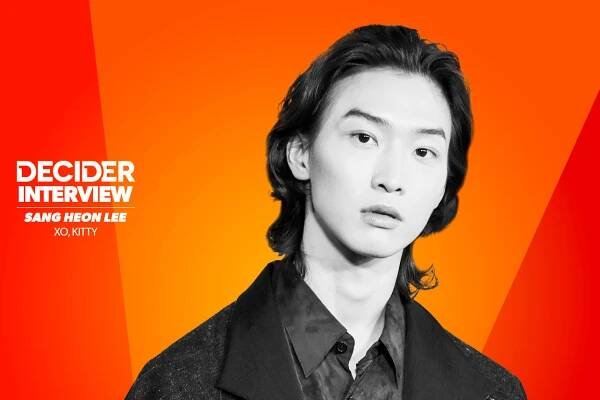 Sang-Heon-Lee in black and white on an orange background