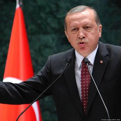 Erdogan vows 'never to accept' genocide charges