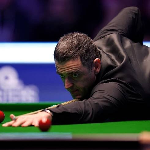 Ronnie O’Sullivan overcomes illness to grind past Barry Hawkins at Masters