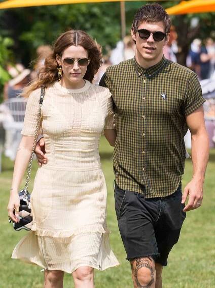 Riley Keough (L) and Ben Smith-Petersen attend the 2016 Veuve Clicquot Polo Classic at Liberty State Park on June 4, 2016 in Jersey City, New Jersey