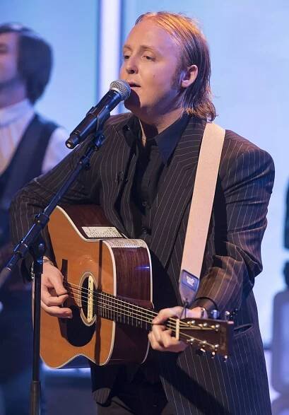 Paul McCartney’s lookalike son James pictured grabbing a coffee with guitar - The Mirror