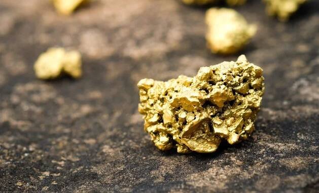 A Golden Lump On A Stone Floor
