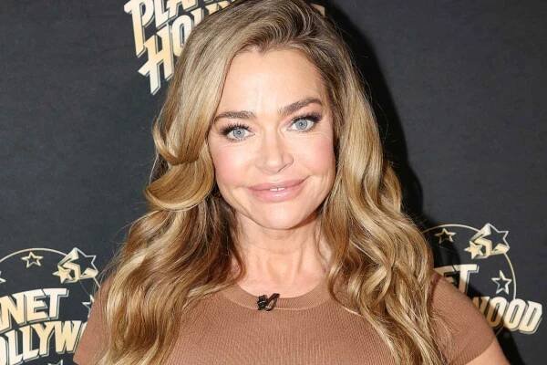 Denise Richards poses as she promotes her new show "Denise Richards and Her Wild Things" at Planet Hollywood Times Square on February 26, 2025 in New York City. 