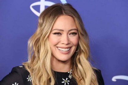 Hilary Duff's Cozy Zip-Up Sweater Is a Practical Choice for Getting Ready in the Morning