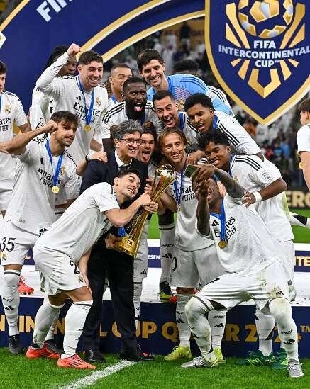Team of Real Madrid celebrates with their trophy after winning the FIFA Intercontinental Cup 2024 final match between Real Madrid and Pachuca in Lusail, Qatar, 18 December 2024. EFE/EPA/NOUSHAD THEKKAYIL