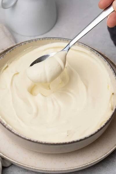 homemade mascarpone in a a bowl.
