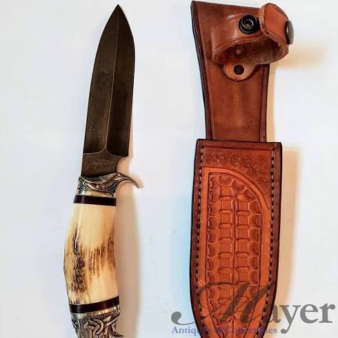 Eagle head knife with Jerry Fisk marked Damascus blade and leather scabbard signed by Alex Shamgar.