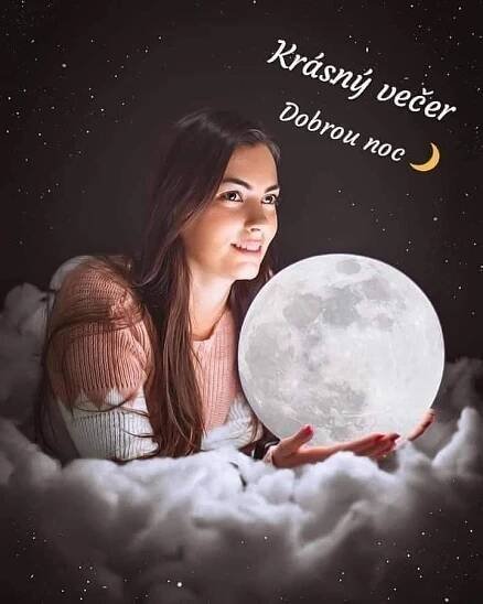 a woman sitting on top of clouds holding a large moon in her hand with the caption, krishy weeer dobrou mo