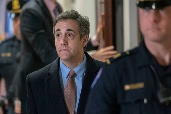 Michael Cohen Claims in Suit He Was Imprisoned to Stop Trump Book