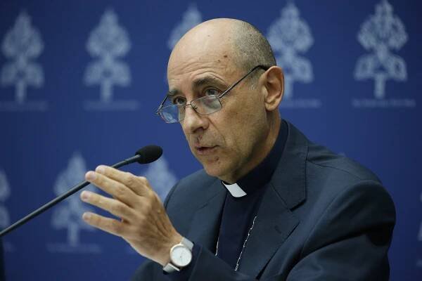 Cardinal Víctor Manuel Fernández, prefect of the Dicastery for the Doctrine of the Faith, speaks to reporters at the Vatican Sept. 19, 2024. The cardinal said on July 3, 2025, that the Catholic Church's approval of blessings of couples in same-sex relationships 
