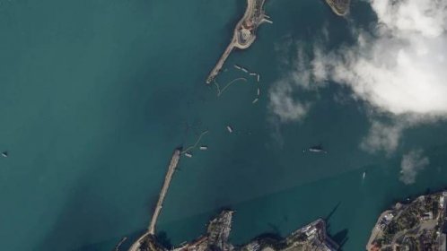 A Planet Labs satellite image taken Nov. 11 shows how an array of booms and barges designed to protect Sevastopol Harbor looked before yesterday's massive storm. PHOTO © 2023 PLANET LABS INC. ALL RIGHTS RESERVED. REPRINTED BY PERMISSION