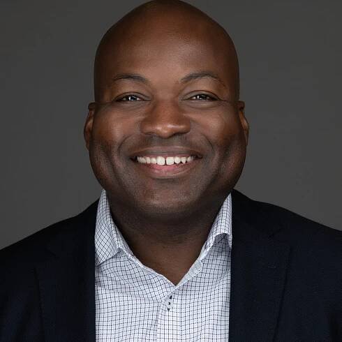 Michael Thompson smiling in headshot