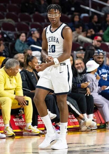 Bryce James plays in front of his Dad LeBron James at The Chosen-1's Invitational at Galen Center on December 16, 2023 in Los Angeles, California