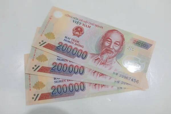 Trasa stříhání Peníze ve Vietnamu (Vietnamská socialistická republika), Dong, VND, Pay, směnárna. — Stock obrázek