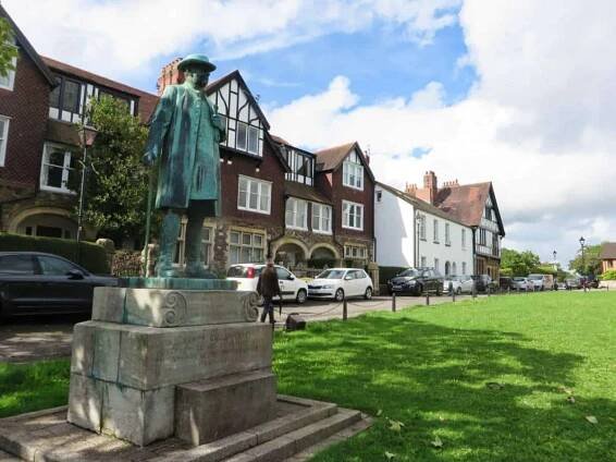 A green sculpture in front of the properties at Llandaff