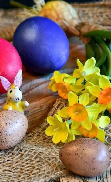 Easter Bunny Figurine with Eggs and Flowers