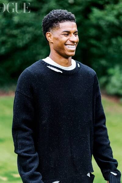 Image may contain Clothing Apparel Marcus Rashford Sweater Human Person Sweatshirt and Sleeve