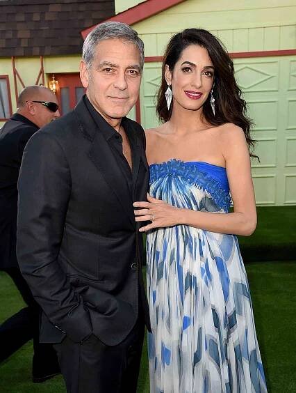 The Clooney Twins Are 1!: A 'Fun and Silly' Dad, George 'Entertains Them for Hours,' Says Insider