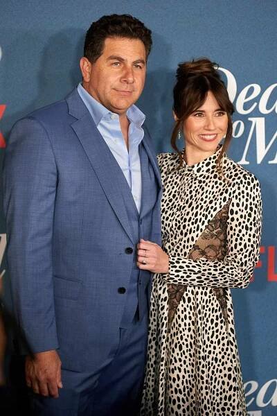 Linda Cardellini with her husband Steven Rodriguez at Netflix's 'Dead to Me' season 3 premiere at Netflix Tudum Theater on Nov. 15, 2022, in Los Angeles.