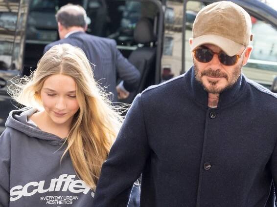 Harper Beckham holds hands with dad David in Paris – and she looks so tall