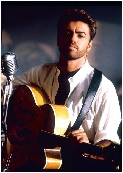 Photo Print of George Michael from the Kissing A Fool video shoot, he is holding his guitar and alongside a microphone. In dimensions A2 - 420x594mm and photo by Chris Cuffaro