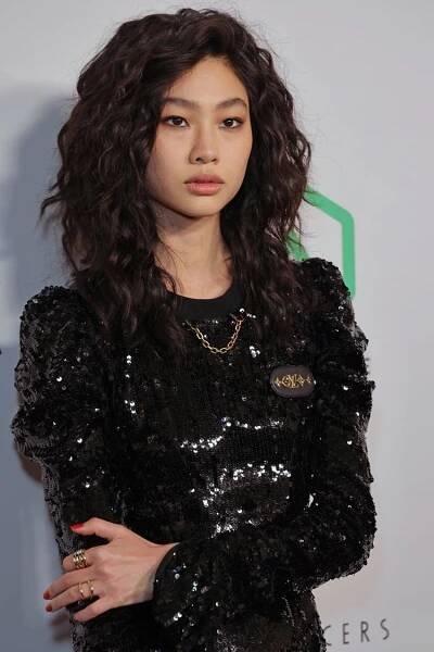 Jung Ho-yeon with a voluminous, permed, '80s haircut