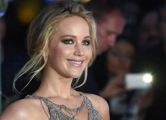 Image may contain Human Person Evening Dress Clothing Gown Apparel Robe Fashion Jennifer Lawrence and Premiere
