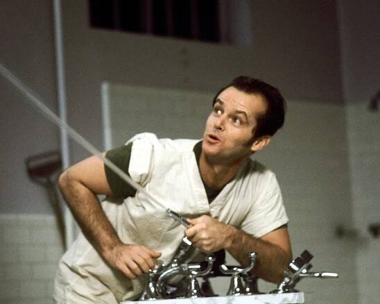 Jack Nicholson in Přelet nad kukaččím hnízdem (1975)