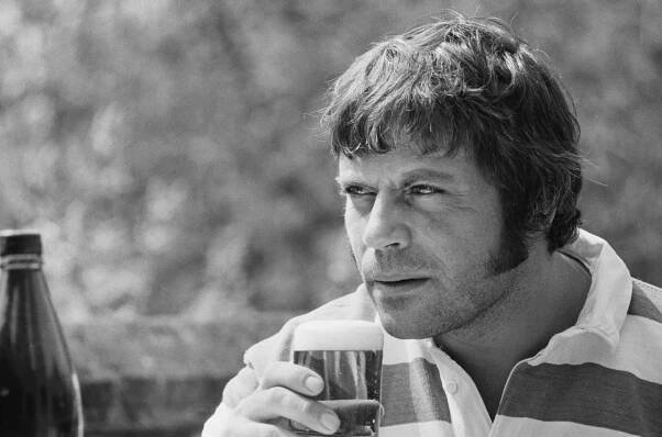 ‘When he’s sober, he’s boring as hell’: 25 years without Oliver Reed, the star who televised his long decline