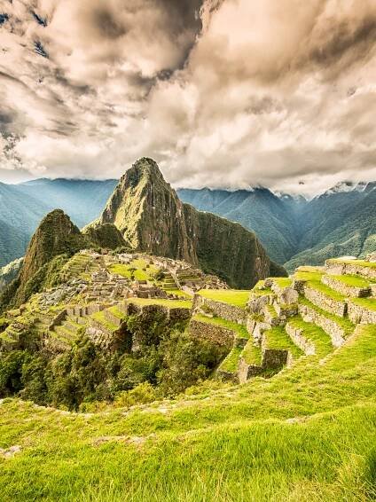 A portrait oriented image of Machu Picchu mountain, taken by adventure photographer Jeff Bartlett