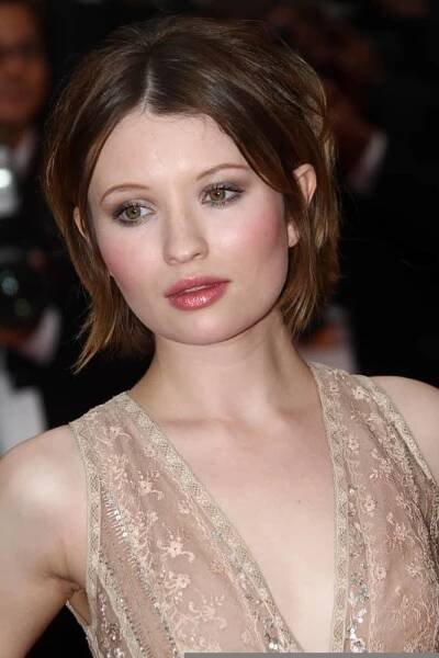 Emily Browning attended the 'Sleeping Beauty' Premiere during the 64 Cannes Film Festival at the Palais des Festivals at Palais des Festivals on May 12, 2011, in Cannes, France. She was lovely in her beige dress and short chin-length brunette hairstyle that has a slight tousle.