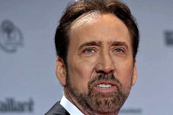 Nicolas Cage once blew $150 million on a private island and a dinosaur skull—here's everything he bought