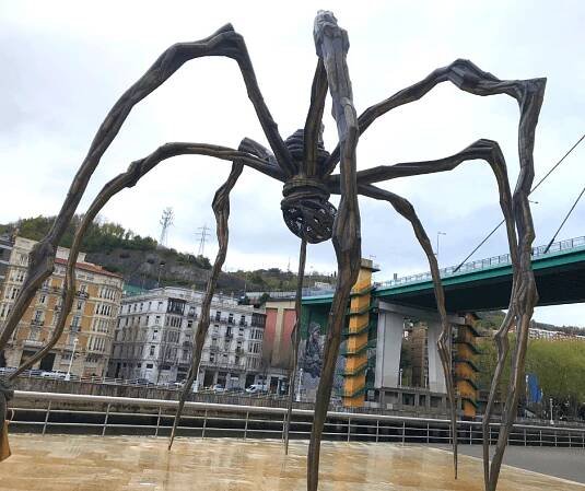 huge spider sculpture "maman" outside the guggenheim museum in Bilbao