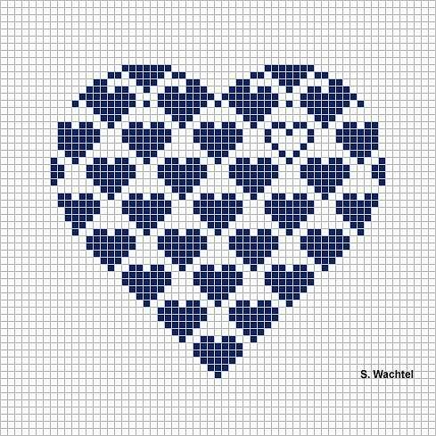 a cross stitch heart pattern in blue and white