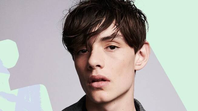 Enola Holmes' Louis Partridge On Millie Bobby Brown & More