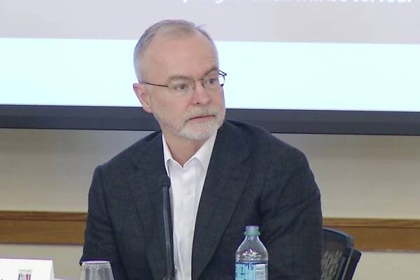 David Kennedy sitting at the panel