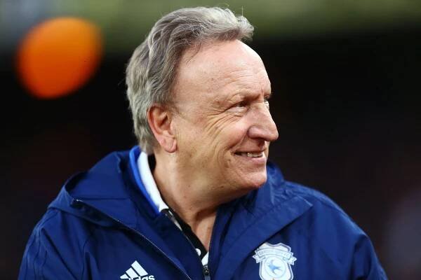 Neil Warnock, manager of Cardiff City, looking to the side.