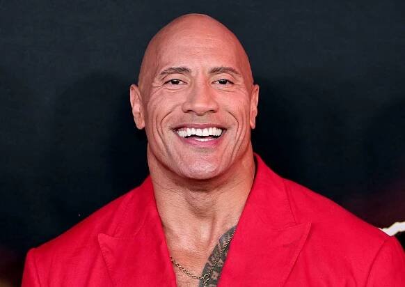 Watch Dwayne "The Rock" Johnson Catch A Giant Fish While Singing A Country Classic