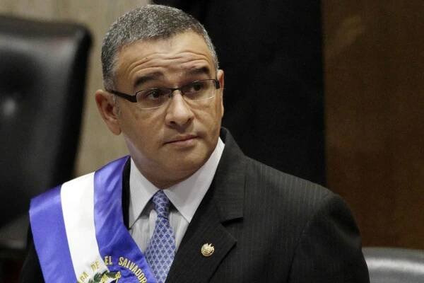 FILE - In this June 1, 2012 file photo, El Salvador's President Mauricio Funes stands in the National Assembly in San Salvador, El Salvador. Former El Salvador President Mauricio Funes, who spent the final years of his life in Nicaragua to avoid various criminal sentences, died late Tuesday. He was 65. (AP Photo/Luis Romero, File)