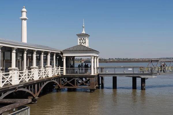 Gravesend Town Pier with people standing on the pier.