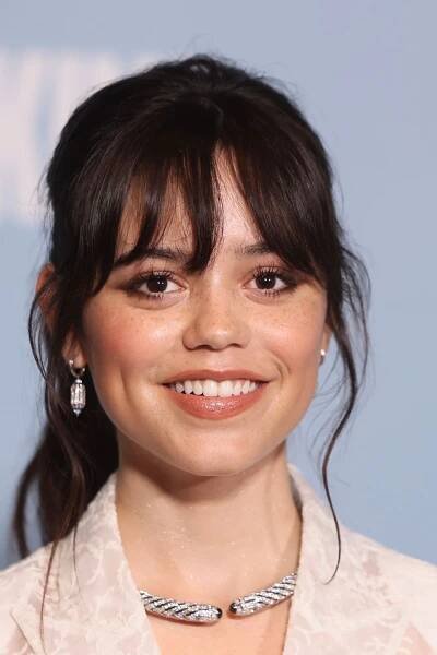 Jenna Ortega Makes a Sudden Departure From Her Signature Look in Sheer White Lace