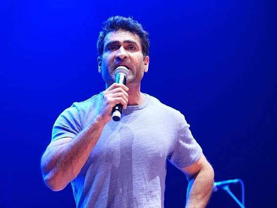 Kumail Nanjiani performing onstage