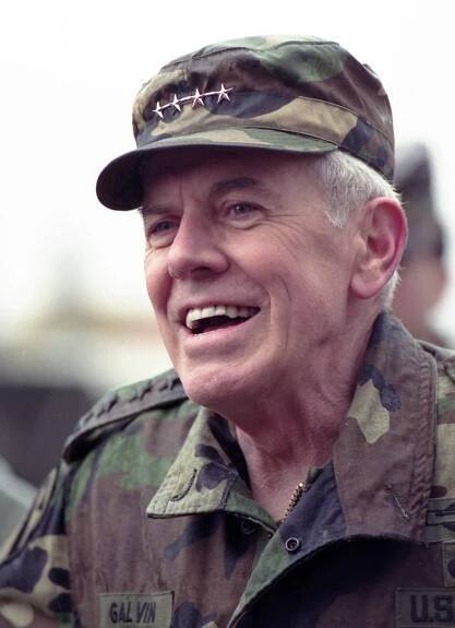 NATO Commander John R. Galvin holds a press conference in Boeblingen, Germany in 1990. General Galvin was a significant friend and mentor to the young David Petraeus. (AP Photo/Thomas Kienzle)